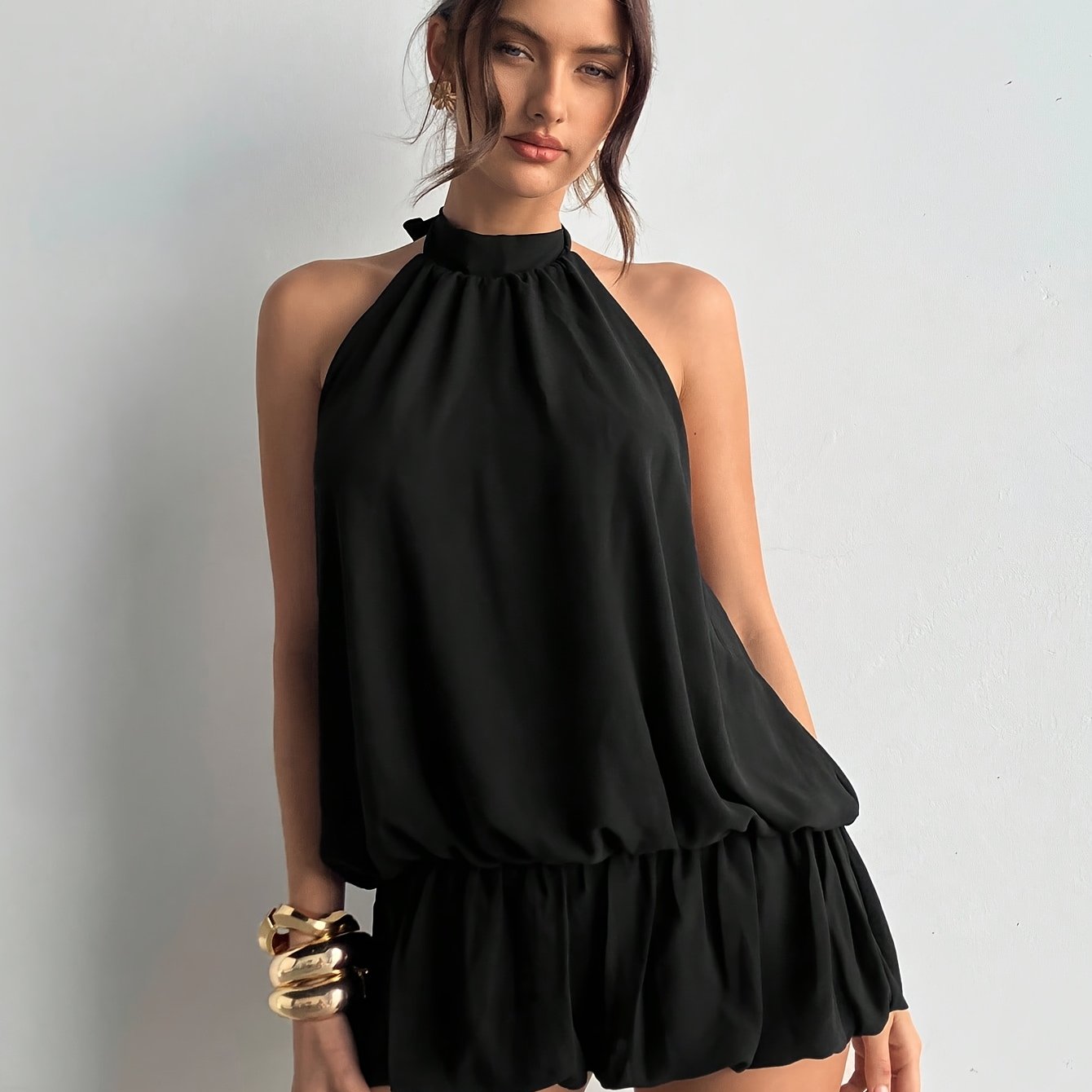 Elegant Little Black Dress for Women with Halter Neck Sleeveless Ruffle Hem Loose Fit Casual Party Style